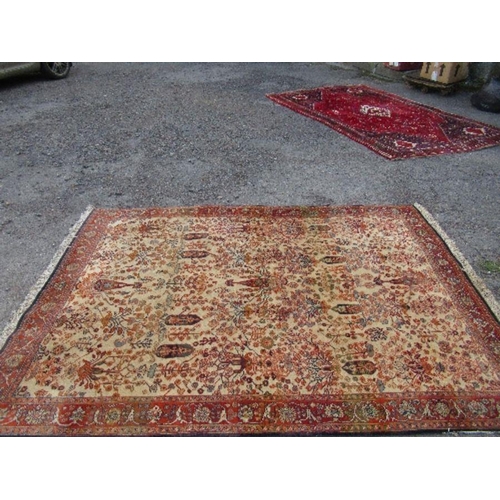 75 - An Eastern design rug, decorated with foliage, 66ins x 93ins