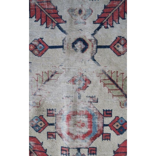 79 - An Eastern design runner, af, 104ins x 40ins, together with a red ground mat, 37ins x 24ins