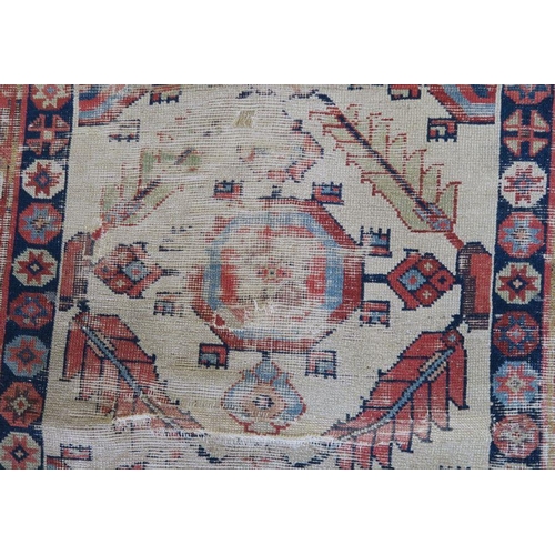 79 - An Eastern design runner, af, 104ins x 40ins, together with a red ground mat, 37ins x 24ins