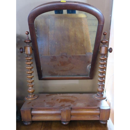 91 - A Victorian mahogany swing frame toilet mirror, with barley twist supports, fitted with drawers to t... 