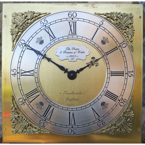 94 - A 20th century mahogany cased long case clock, the brass dial inscribed The Prince and Princess of W... 