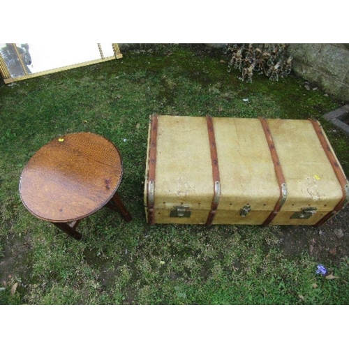 96 - A travelling trunk, together with an oak table