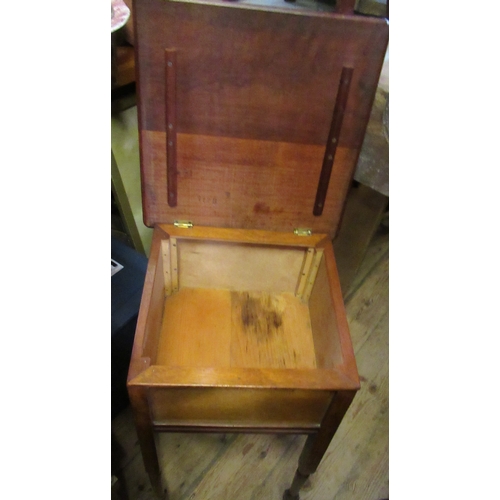 97 - A mahogany plant stand, a cane stool and a sewing box