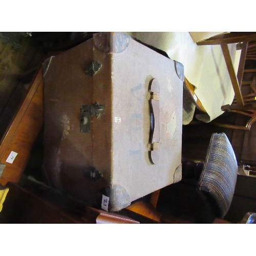 21 - A circular coffee table, together with a trunk, a magazine rack and a mahogany box with coat of arms... 