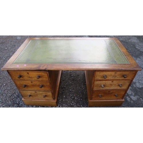 16 - An Edwardian oak pedestal desk, with leather inset writing surface, the pedestals fitted with drawer... 