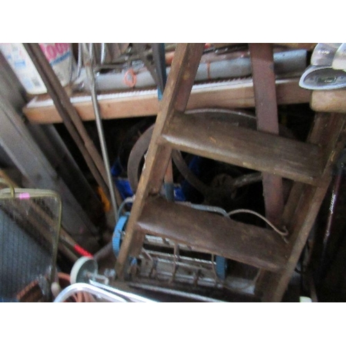 17 - A large collection of garden tools, ladders, etc.