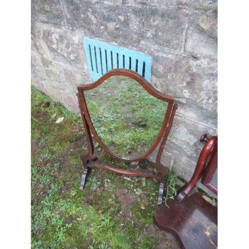 192 - Two swing frame toilet mirrors, one with painted floral decoration