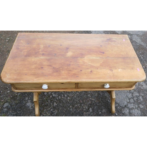 29 - An Antique pine wash stand, fitted with two frieze drawers, on end supports united by a stretcher, 3... 