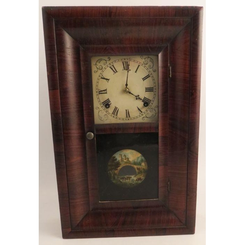 299 - E N Welch Manufacturing Co., an American wall clock, of rectangular form, having a square dial, the ... 