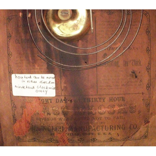 299 - E N Welch Manufacturing Co., an American wall clock, of rectangular form, having a square dial, the ... 