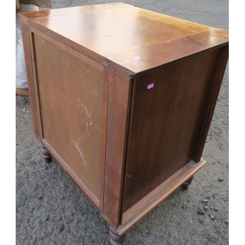 38 - A continental cupboard, with deep relief moulded panel door, raised on a turned legs, width 27.5ins ... 