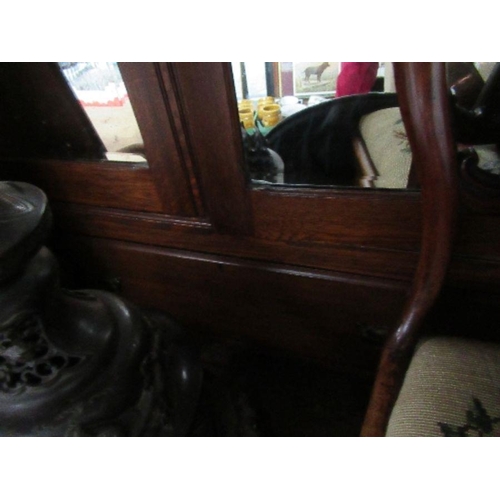 4 - An Edwardian mirror door wardrobe, with carved decoration, width 47ins x height 83ins