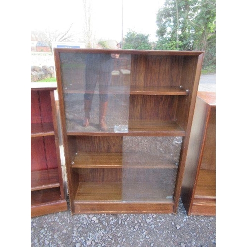 43 - A mahogany set of shelves, width 49ins x height 36ins, together with two sets of Gibbs Furniture she... 