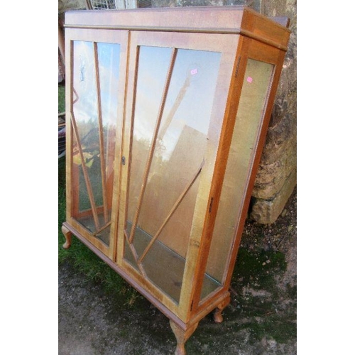 52 - An Art Deco style two door display cabinet, raise don short cabriole legs, width 36ins, height 49.5i... 