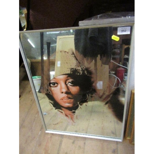 552 - A mirror, with image of a model, monogrammed N Greensmith