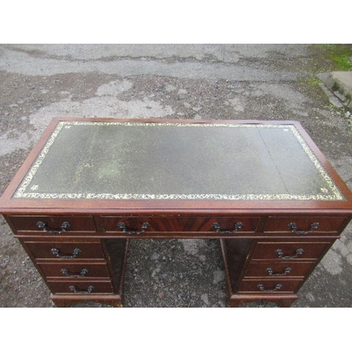 58 - A reproduction pedestal desk, with leather writing top, 47ins x 24ins x height 30.5ins