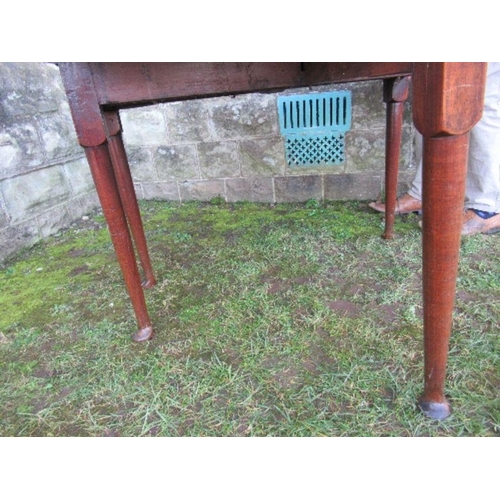 62 - A Georgian mahogany gate leg table, raised on turned legs terminating in pad feet, width 48ins x hei... 