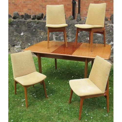 22 - A 20th century extending dining table and four chairs, possibly Golden Key Alfred Cox, table 62.5ins... 