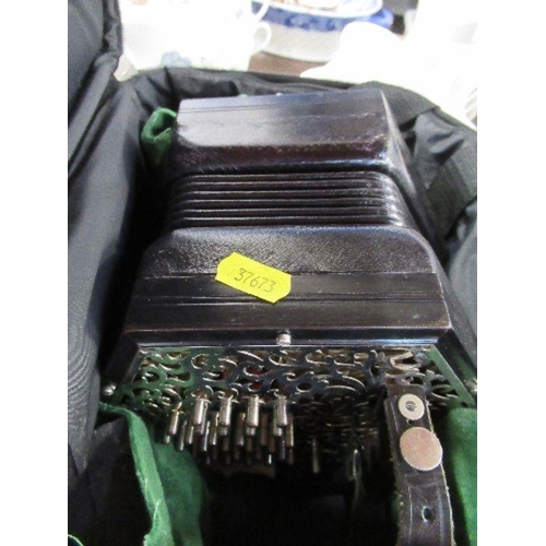 243 - A Lachenal & Co concertina, with 56 buttons