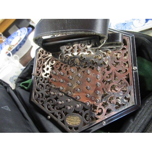 243 - A Lachenal & Co concertina, with 56 buttons