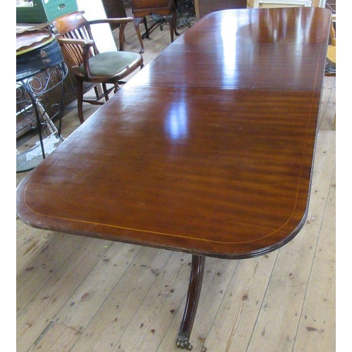 26 - A Regency style reproduction mahogany dining table, raised on pedestals, together with 6 (4+2) dinin... 