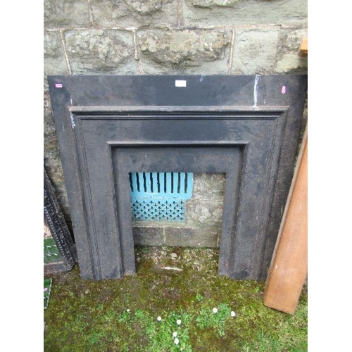 89 - Three wrought iron fire places, with loose and broken tiles, together with a wooden fire surround