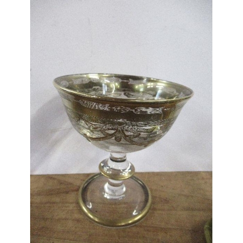 132 - An Italian style gilt illusion glass, height 4ins