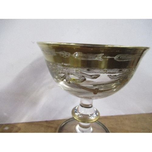 132 - An Italian style gilt illusion glass, height 4ins