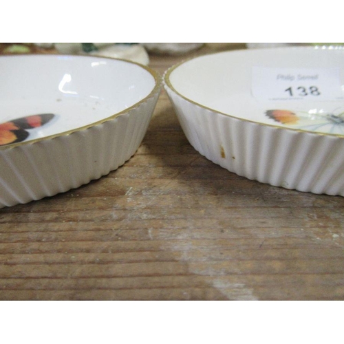 138 - Two Royal Worcester oval pin dishes decorated with a butterfly by Smith, maximum diameter 4.5ins