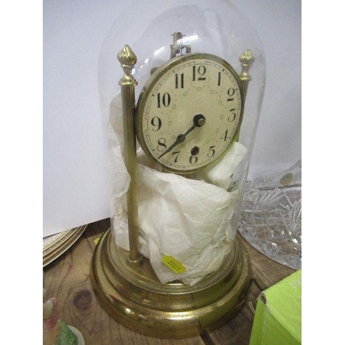 140 - A Consort ships glass decanter, with stopper and an anniversary clock