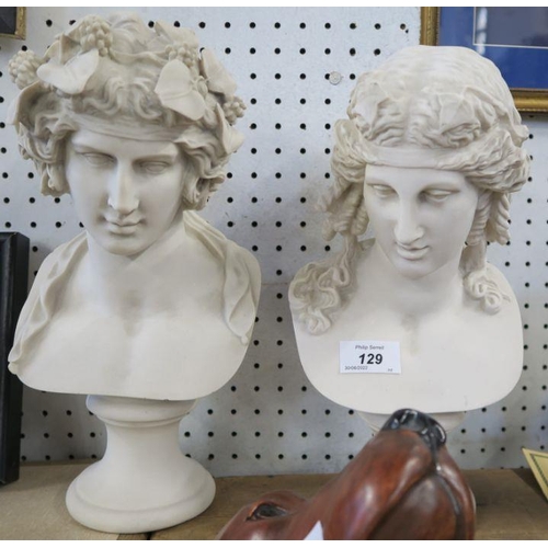 144 - A pair of modern composition busts, in the Classical style, on socle bases, height 12ins