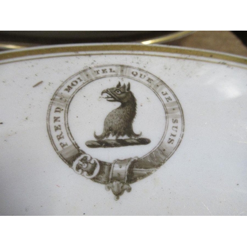 145 - 19 dinner plates, printed with a crest, together with two others