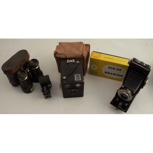 147 - A Coronet Midget camera, with case, together with a Kodak six-20 Brownie Junior, a Kodak Six-20 Brow... 