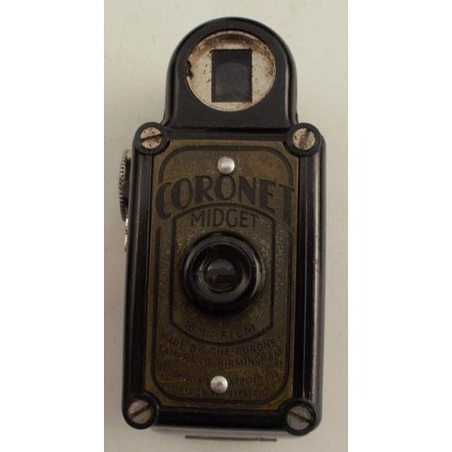 147 - A Coronet Midget camera, with case, together with a Kodak six-20 Brownie Junior, a Kodak Six-20 Brow... 