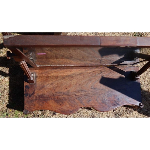 15 - A 19th century mahogany dressing table mirror, with carved top rail over a mirror, raised on turned ... 