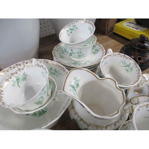 152 - A 19th century English porcelain tea service, comprising tea pot, jug, sugar bowl, 7 tea cups, 7 cof... 