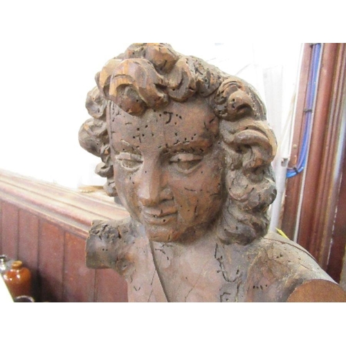 163 - An Antique Italian wooden model of cherub, missing arms, height 26.5ins