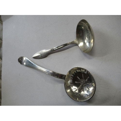 166 - An Antique Swedish silver sifter, dated 1823, together with a Swedish silver ladle 1928, weight 2.5o... 