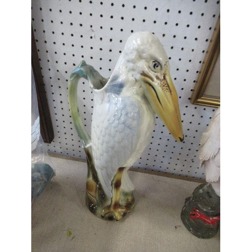 175 - A stork jug, together with two bird models