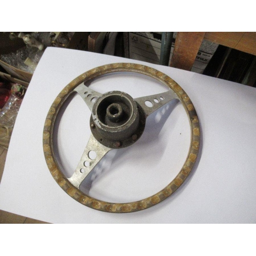 179 - A wood and aluminium steering wheel, diameter 14ins