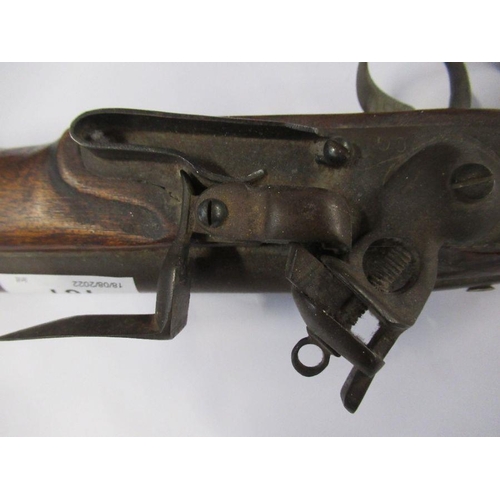 181 - A reproduction mahogany and metal flint lock pistol, length 15ins