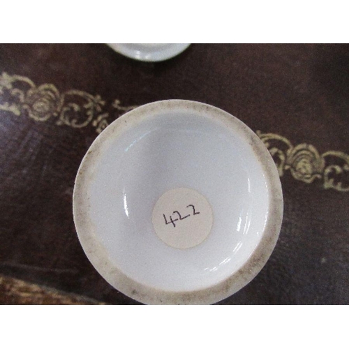 189 - An 18th Century, possibly Worcester, tea bowl, together with a 19th century style egg cup decorated ... 