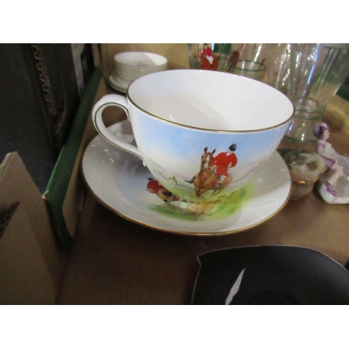 213 - A Royal Crown Derby over sized breakfast cup and saucer, decorated with a hunting scene by J D Preal... 