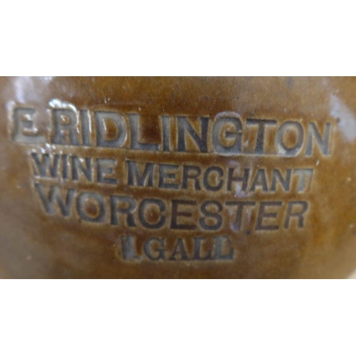 214 - E Ridlington Wine Merchant Worcester, a 1 Gall stoneware bottle