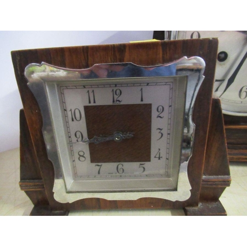 216 - An oak cased mantel clock, together with another mantel clock