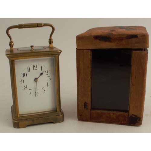 223 - A cased repeating carriage clock, with enamel dial and leather covered travelling case