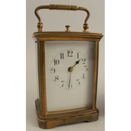 223 - A cased repeating carriage clock, with enamel dial and leather covered travelling case