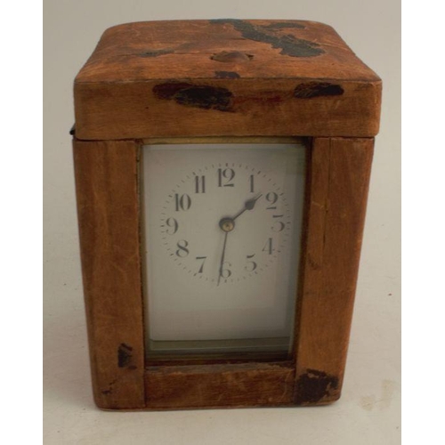 223 - A cased repeating carriage clock, with enamel dial and leather covered travelling case