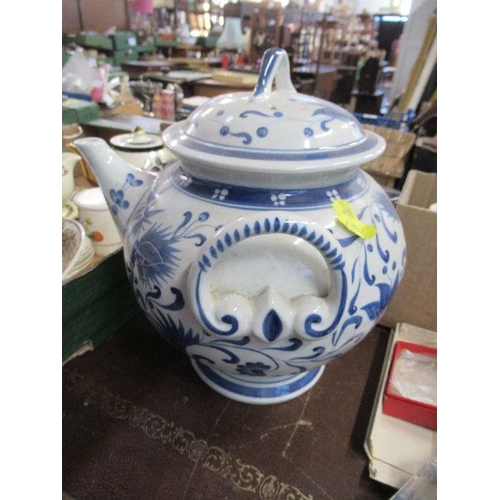 240 - A blue and white vessel, with short spout, two handles and cover