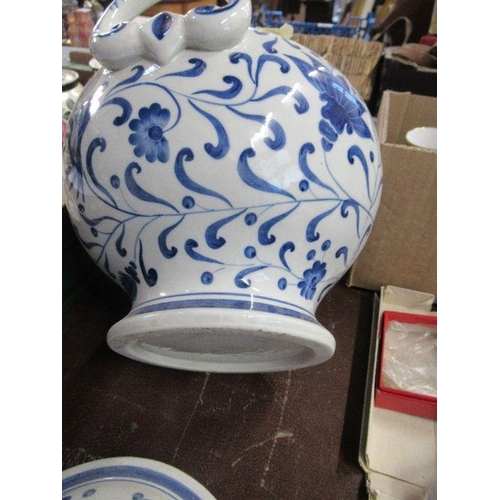 240 - A blue and white vessel, with short spout, two handles and cover